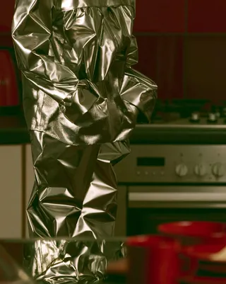 Fashion Editorial Featuring Hand-knitted Metallic Outerwear preview
