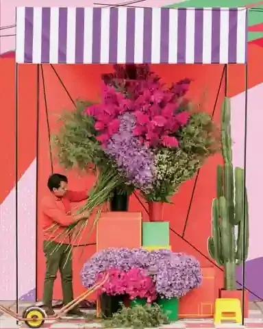 Night-market Florist Building Enormous Bouquets, a Midjourney sref remix: a night-market florist building enormous bouquets beneath striped awnings, playful graphic style